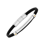 Angled view of a black twisted cable bracelet with a polished silver-tone bar and gold-tone screw details