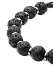 Close-up of black lava stone beaded men's bracelet with silver disc spacers and adjustable black cord